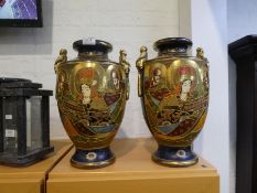 A pair of large early 20th century Satsuma vases, 38.5cms and a French Quimper platter decorated fig