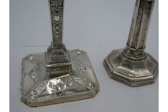 A large heavily decorated silver candlestick having embossed, ornate decoration and beaded borders. - Image 6 of 12