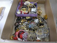 A tray of modern costume jewellery and various Designer watches including "D & G", Sekonda, etc