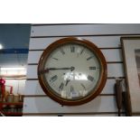 A vintage wall clock with Roman numerals, train station in style