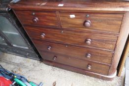 A Victorian mahogany chest having two short and three long drawers and two other items
