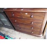 A Victorian mahogany chest having two short and three long drawers and two other items