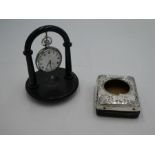 A silver Half Hunter pocket watch on a stand, the enamel dial marked J.W. Benson London, having Roma