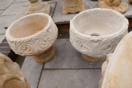 A pair of modern garden urns