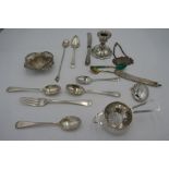 A quantity of silver items to include enamel spoons, a pierced silver dish, miniature candlestick, f