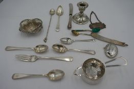 A quantity of silver items to include enamel spoons, a pierced silver dish, miniature candlestick, f