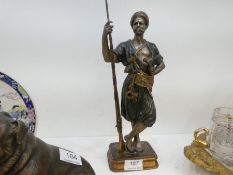 Jean Didier Debut; French (1824 - 1893), a patinated bronze figure of Arab solider holding rifle jan