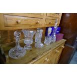 An Edinburgh crystal cut glass vase, decanters and similar