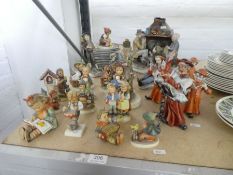 Twelve Hummel figures (one being a lamp) Capodimonte figures and similar