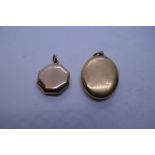 Two yellow metal lockets, one oval example and an octagonal mourning one with inscription Jan 15 184