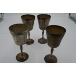A quantity of four silver goblets having grape vine engraved decoration Hallmarked, Birmingham 1971-