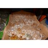Three boxes of crystal including glasses, crystal bowls, decanters, etc