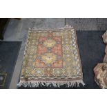 Two Geometric style rugs