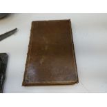 An early 18th Century leather bound book on the Art of Surveying and Measuring of Land, by John Love