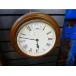 An old mahogany wall clock, the dial 25cms