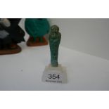 An Egyptian Shabti of turquoise colour