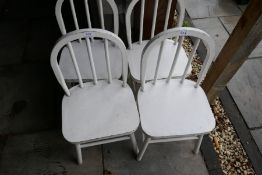 A set of four stickback children's chairs