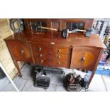 A 1930's leaded glass bookcase and a sideboard