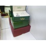 A Genuine ROLEX watch box in green, complete with a Rolex Guarantee booklet and a "Hints on the care