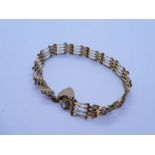 9ct yellow gold 4 bar gate link bracelet with heart shaped clasp and safety chain marked 375, approx