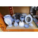 Collection of Blue Wedgwood Jasperware including plaques, clock, vases, etc