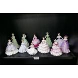 A quantity of figurines Royal Doulton, Coalport, Royal Worcester and others, 20