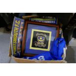 Of football interest; Portsmouth Football Club merchandise, some signed, and a framed embroidery for