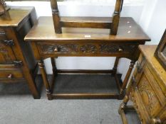 A reproduction oak side tables, each having one drawer, the largest 83.5cms