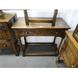 A reproduction oak side tables, each having one drawer, the largest 83.5cms