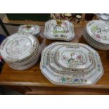 A quantity of Spode Ironstone dinnerware decorated birds and flowers including ten graduated platter