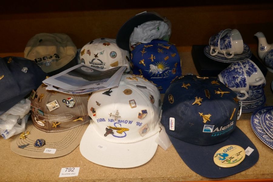 Collection of Flying caps adjorned with aeroplane badges, etc, including 'Paris Air Show' 1995 examp