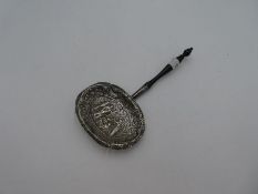 An ornate white metal sifter having pierced design. Very pretty, decorative design possibly of Virgi