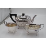 A silver octagonal tea service by Viners Ltd comprising a teapot, two handled sugar bowl and milk ju