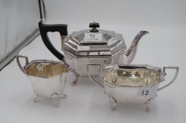 A silver octagonal tea service by Viners Ltd comprising a teapot, two handled sugar bowl and milk ju
