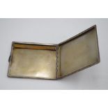 An Egyptian silver cigarette case possibly 1940s Alexandria. With engine turned pattern, and initial