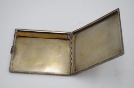 An Egyptian silver cigarette case possibly 1940s Alexandria. With engine turned pattern, and initial