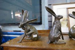 Six modern bronze style figures of Hares
