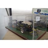 Tamiya; a 1;12 scale model of Lotus J.P.S MkIII Formula One car in perspex case