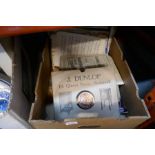A box of 78s and sheet music and 78s