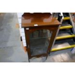 A glazed 2 shelf display cabinet decorated with inlaid marquetry border