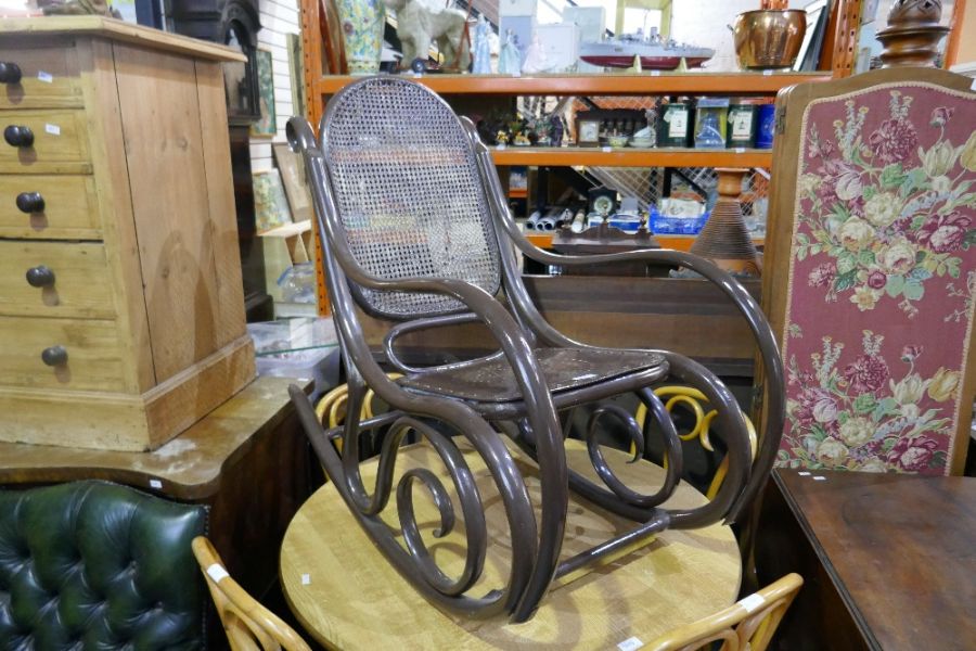 A Bentwood rocking armchair and a stool