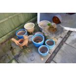 A reconstituted bird bath in form of clam shell, garden pots and sundry