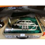 A boxed wind instrument and a reproduction car horn