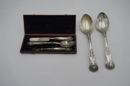 A pretty Georgian cased Christening set of a silver knife, spoon and fork with embossed handle. Hall