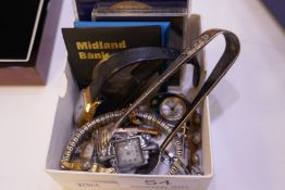 Box containing watches, coins, silver, sugar tongs etc