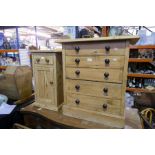 An old stripped pine box commode and a pine bedside cupboard