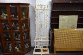 A Victorian style cast metal bamboo design hall stand