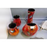 Four modern Poole vases, (two decorated poppies)