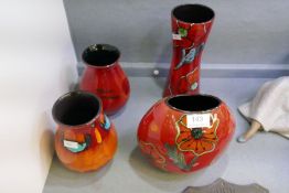 Four modern Poole vases, (two decorated poppies)