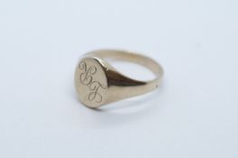 9ct gold gent's signet ring with oval panel, inscribed initials LR, size Z, 7.4g approx